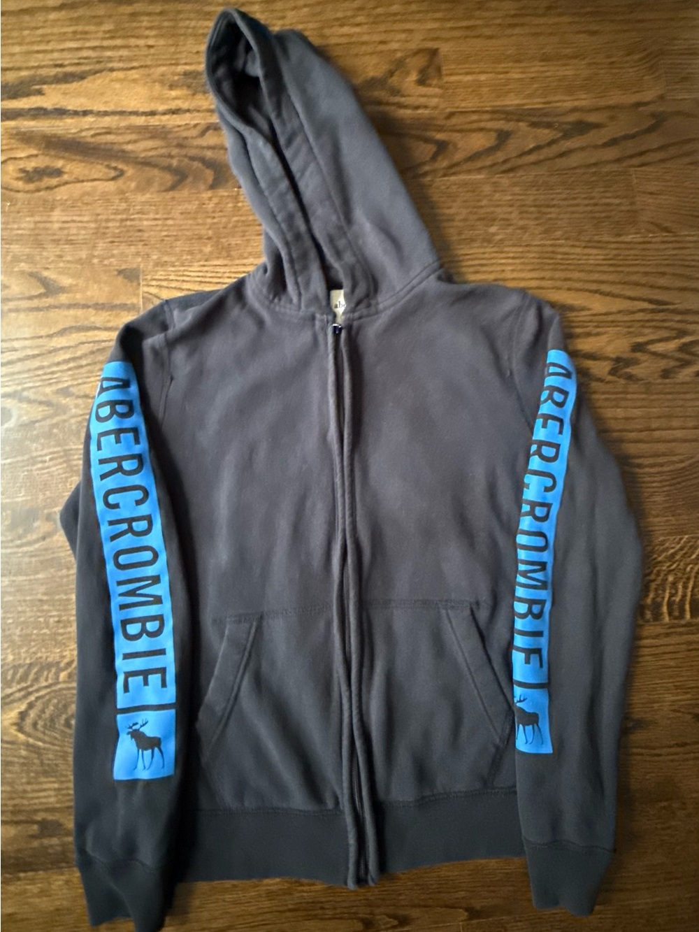 abercrombie kids black hoodie with blue sleeve lettering